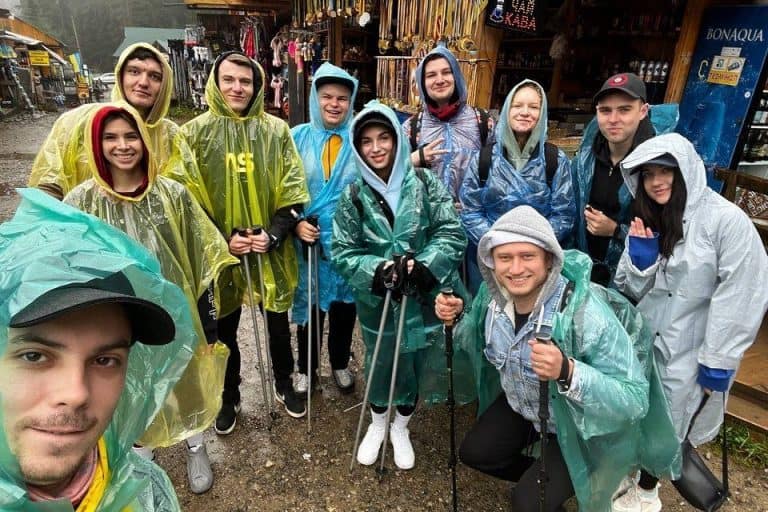 group of people in tracking clothes.