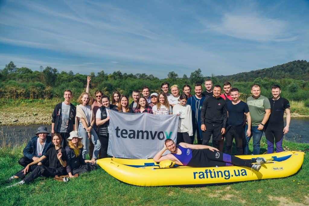 group of people with kayaks