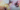 A blurry image of a man in a suit.