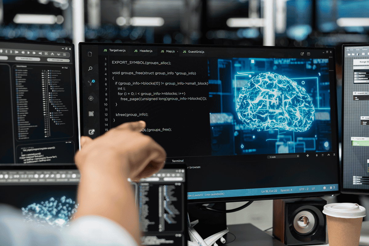Software developer programming AI code with digital brain visualization on multiple monitors