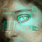 Biometric facial recognition scan with eye tracking and digital interface overlays on human face